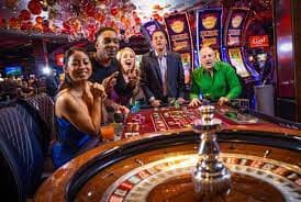 NetEnt slot games displayed on mobile phone screen including Gates of Olympus and Fortune Tiger